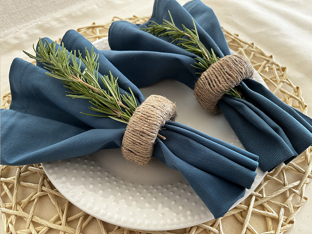Blue napkins with jute napkin rings