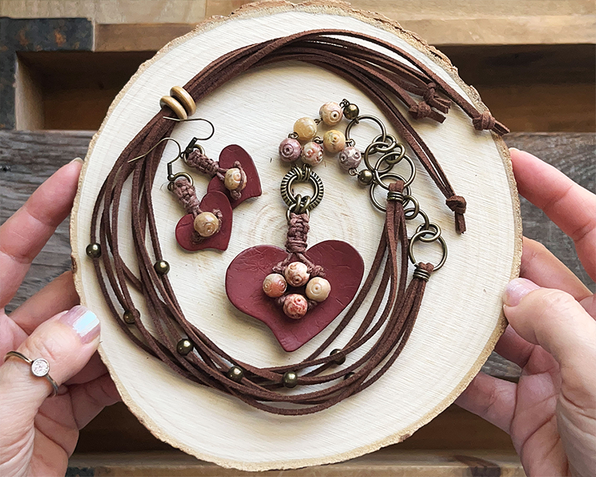 Boho-style jewelry set with earthy tones: heart-shaped coconut pendant, faux suede cord, and stone beads