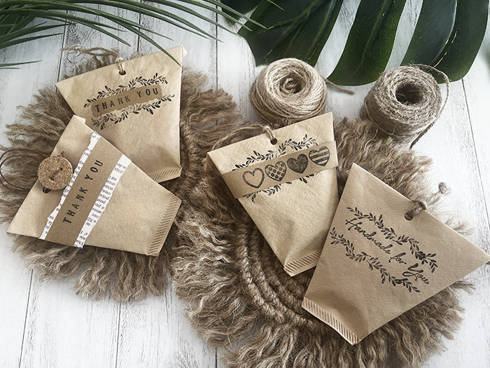 Sample design of small treat bags made with coffee filters, featuring a unique pattern