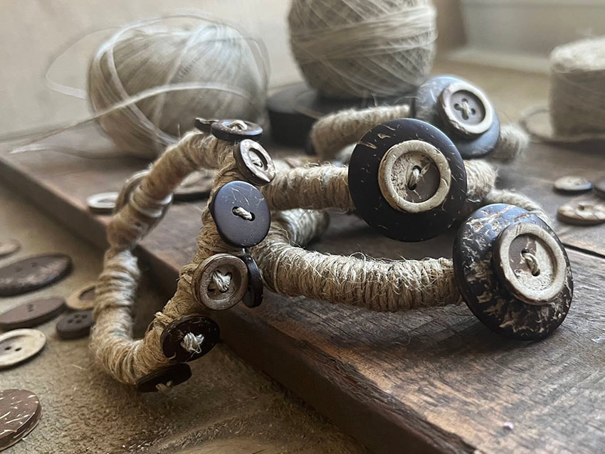 Earthy coconut shell button jute cord wrapped button & loop closure bracelets 